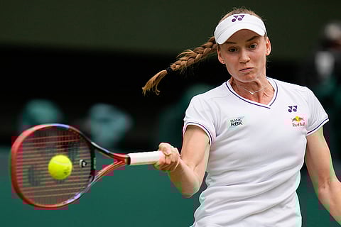 Elena Rybakina plays a forehand return to Elina Svitolina
